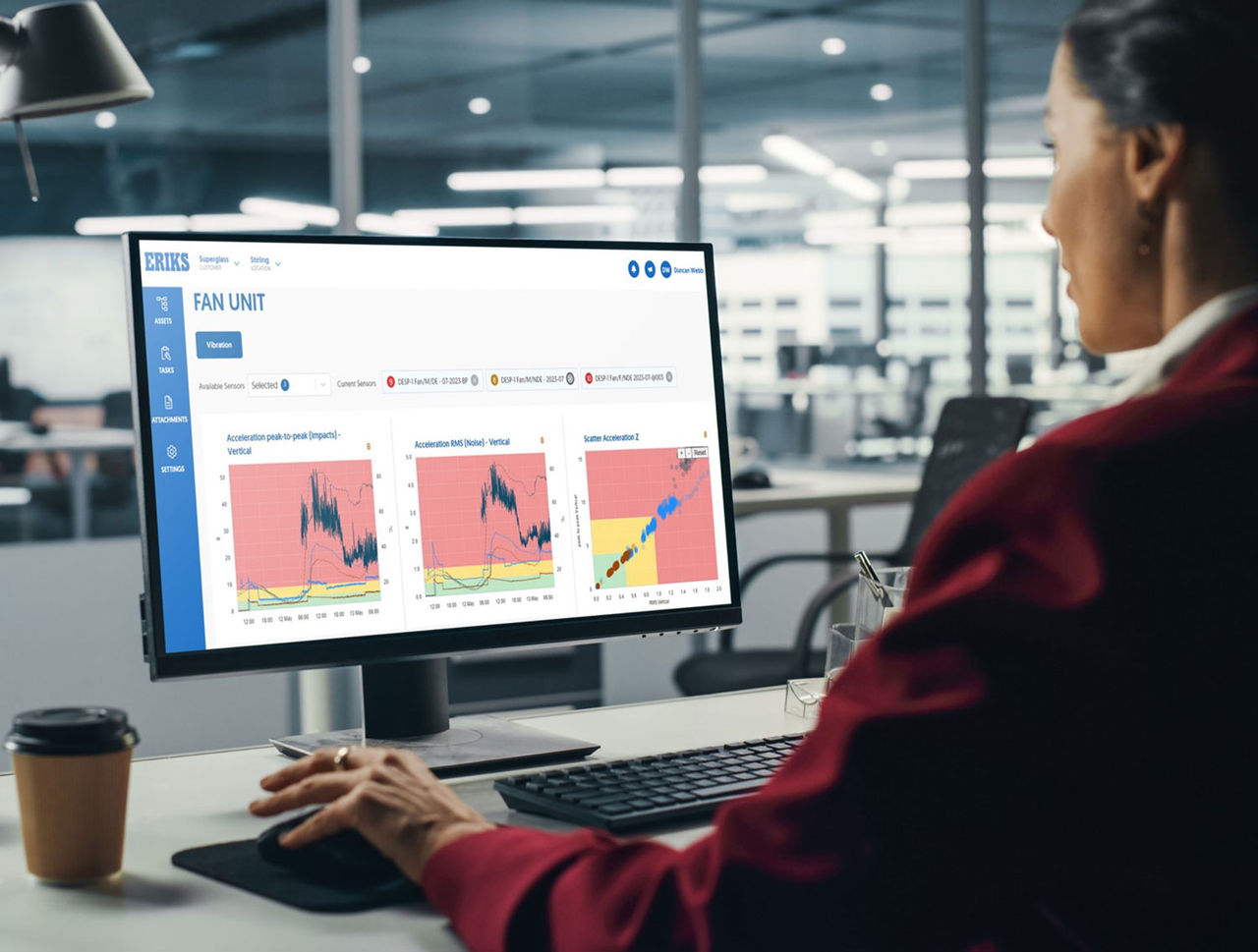 Person looking at a cmputer showing the Smart Asset Management dashboard for a Fan Unit