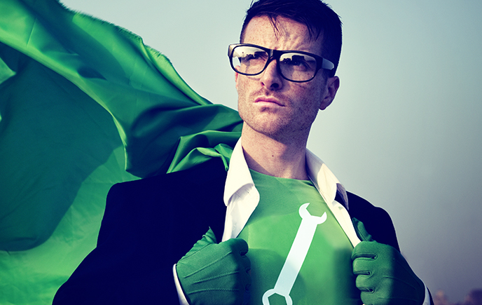 Super hero engineer in green cape