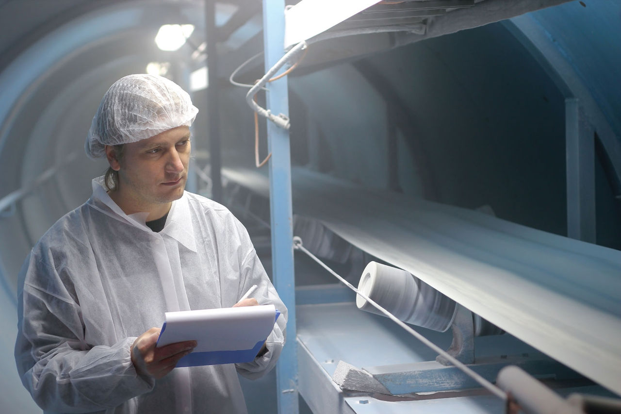 quality control check on production line in sugar refinery