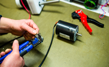 Engineer re-wiring Celinoid