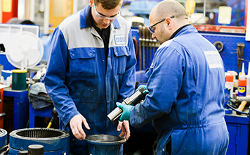 Engineers in Repair Workshop