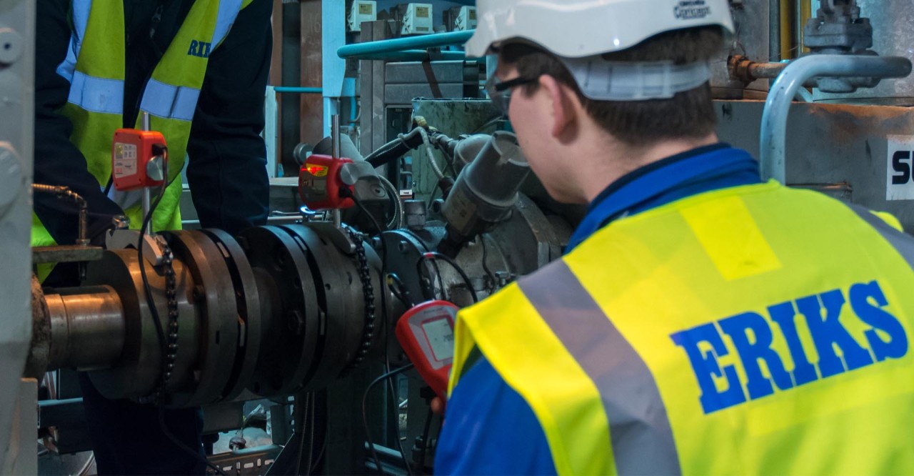 Engineer using testing equipment