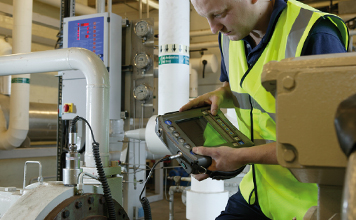 Engineer testing Vibration on equipment